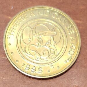 Vintage 1996 Chuck E Cheese Pizza Token - Where a Kid Can Be A Kid Coin shaped